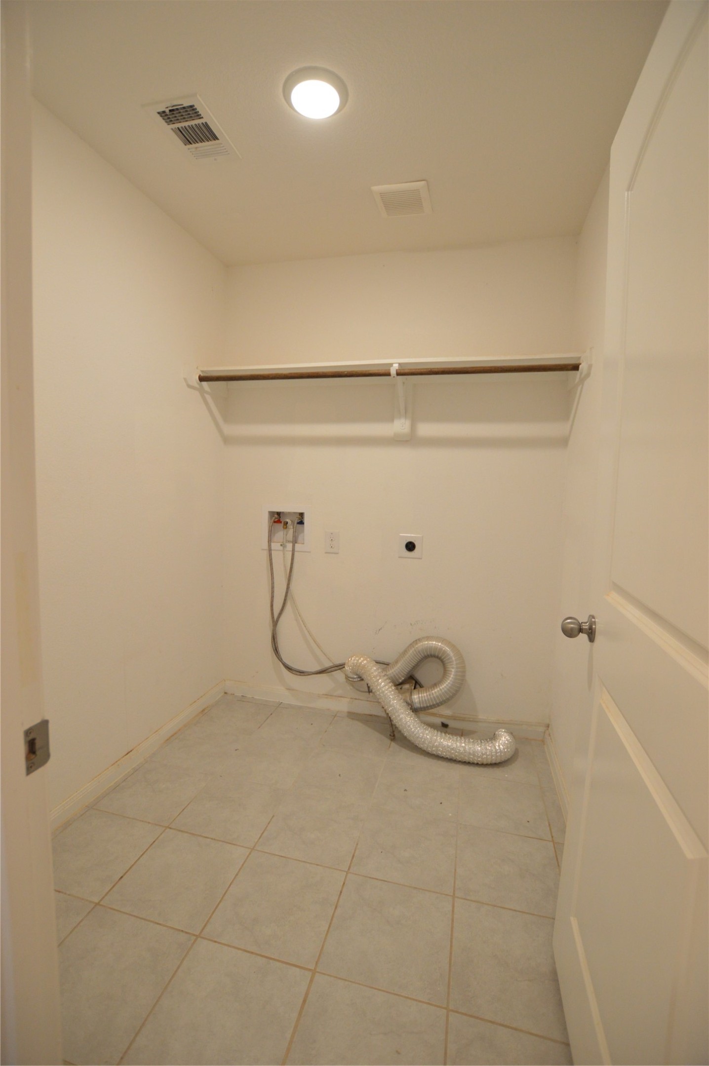 3059 Caddo Willis, TX 77378 - Photo 4 of 27 a view of a room with racks on the wall
