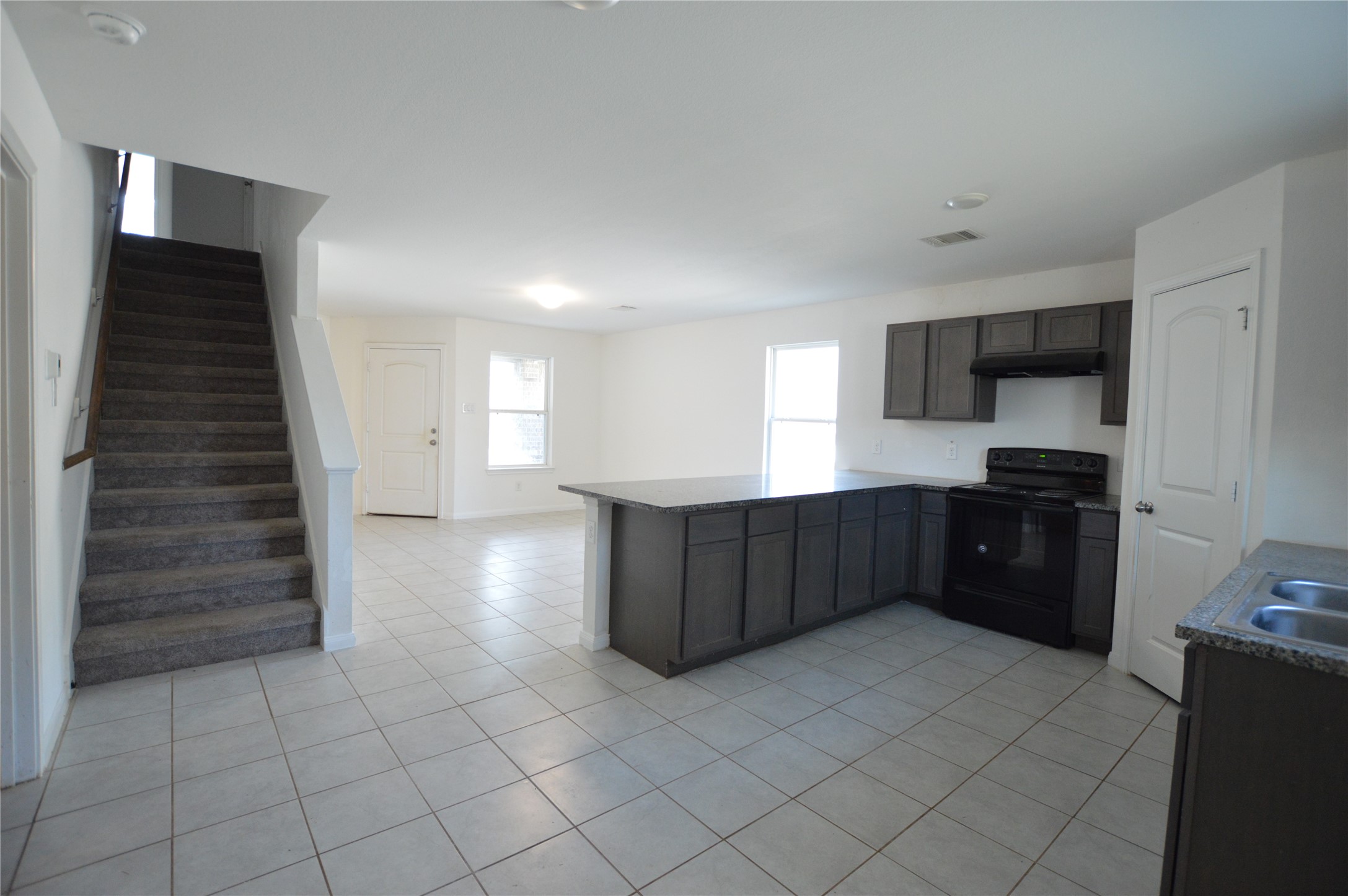 3059 Caddo Willis, TX 77378 - Photo 8 of 27 a kitchen with a cabinets and counter space