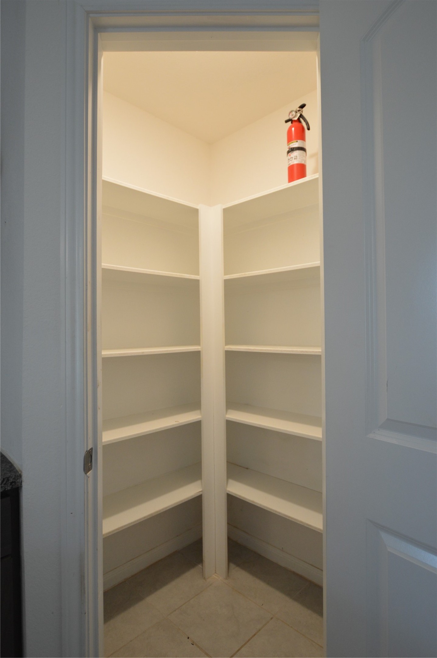 3059 Caddo Willis, TX 77378 - Photo 9 of 27 a view of walk in closet with empty racks