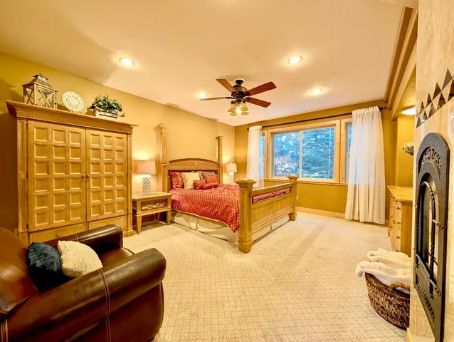 a large kitchen with cabinets and stainless steel appliances