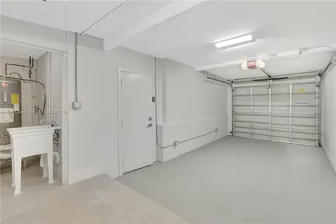 a bedroom with a bed and a table