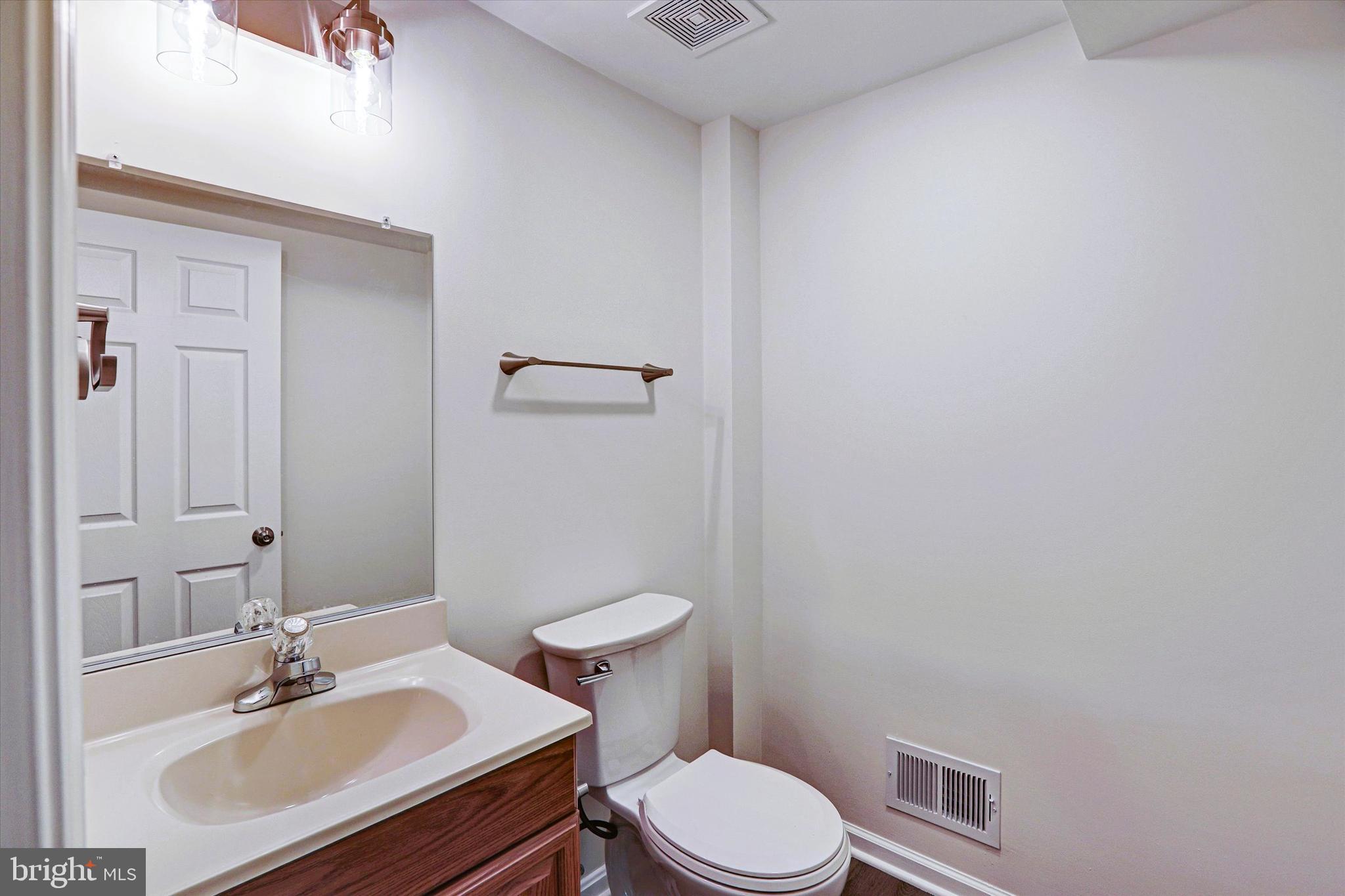 6405 Quiet Night Ride Columbia, MD 21044 - Photo 46 of 63 Lower level powder room
