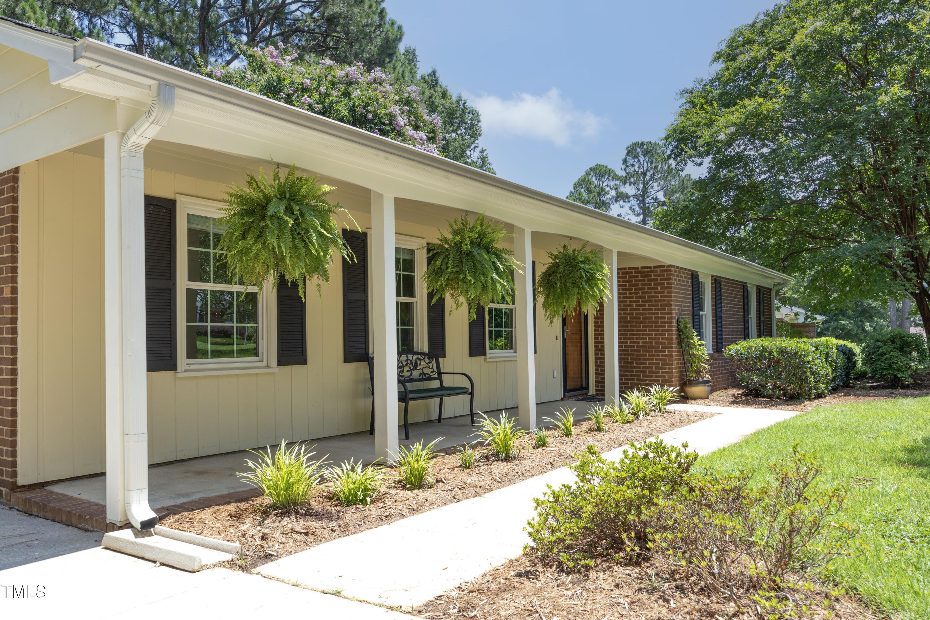 3112 Carovel Court Raleigh, NC 27607 - Photo 4 of 44 Perfect porch from which to enjoy a sunset!