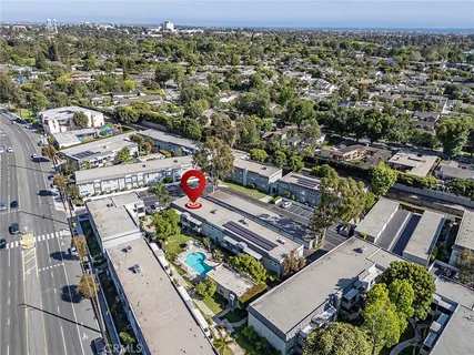 an aerial view of a house with outdoor space
