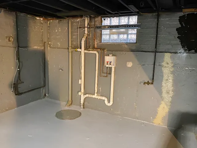 a view of a house with wooden fence