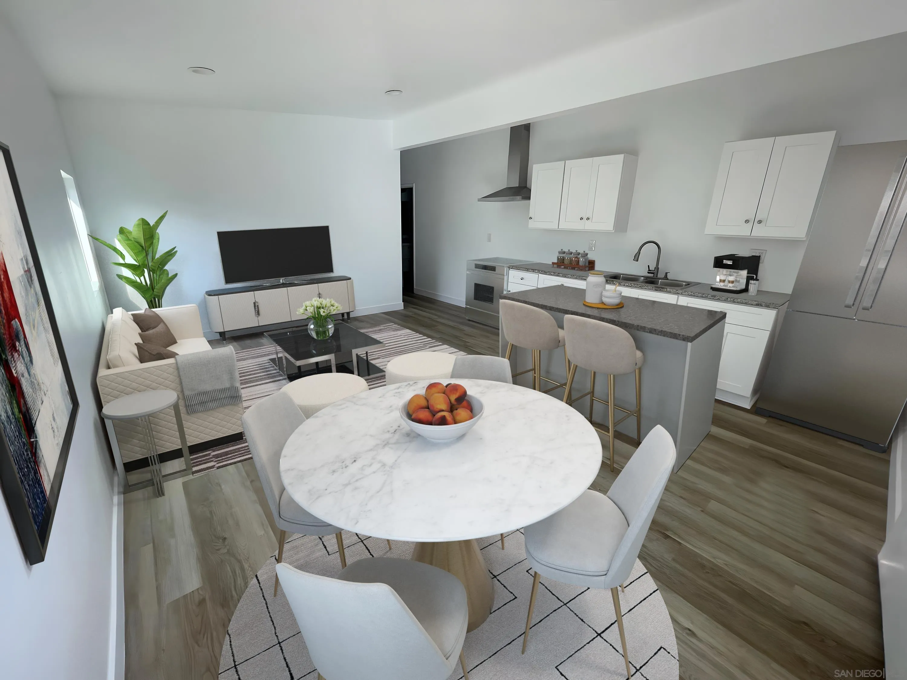 8632 Eileen Street Spring Valley, CA 91977 - Photo 4 of 12 a kitchen with a table chairs a stove a microwave and dining table