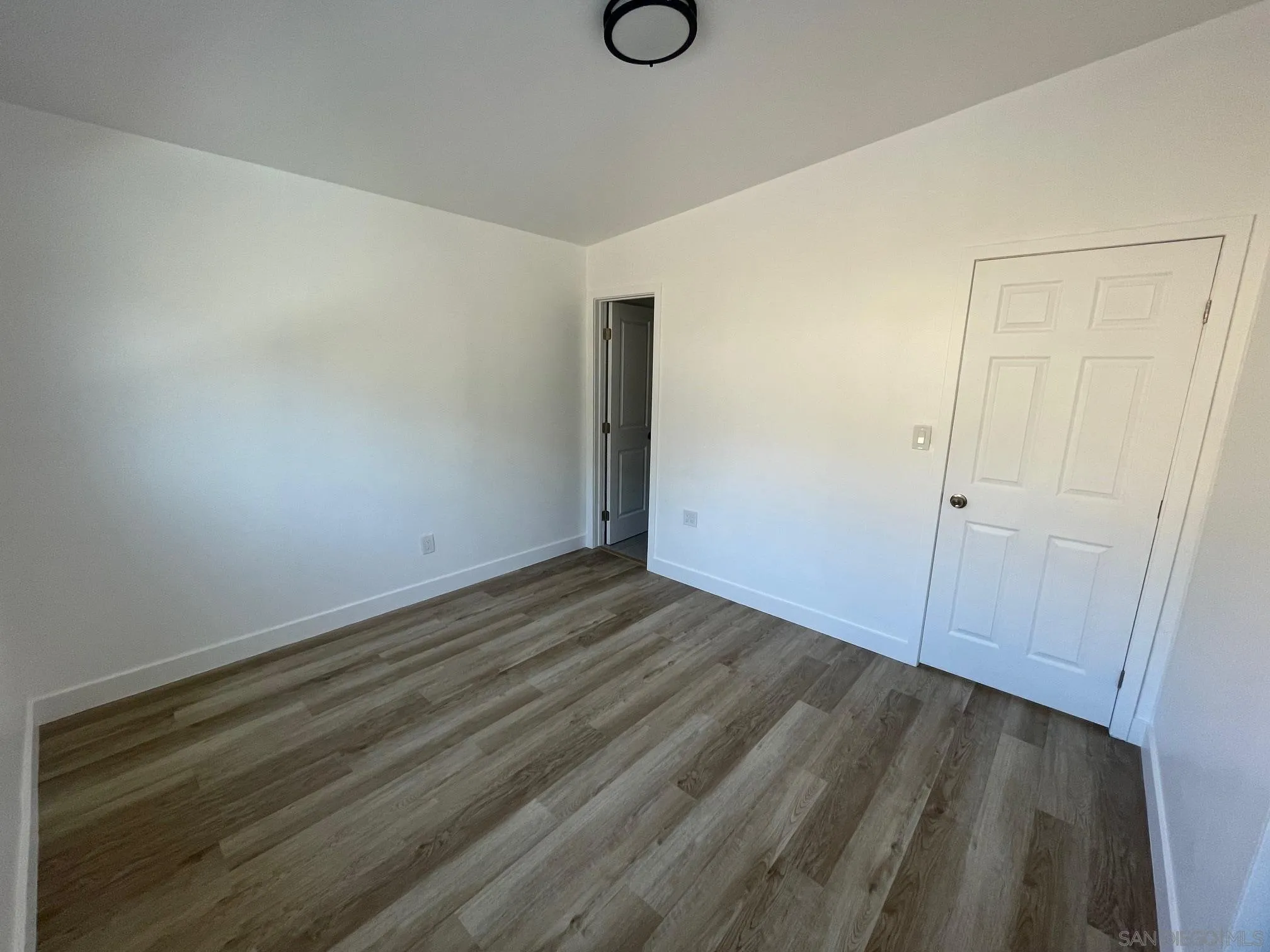 8632 Eileen Street Spring Valley, CA 91977 - Photo 6 of 12 a view of small space with wooden floor