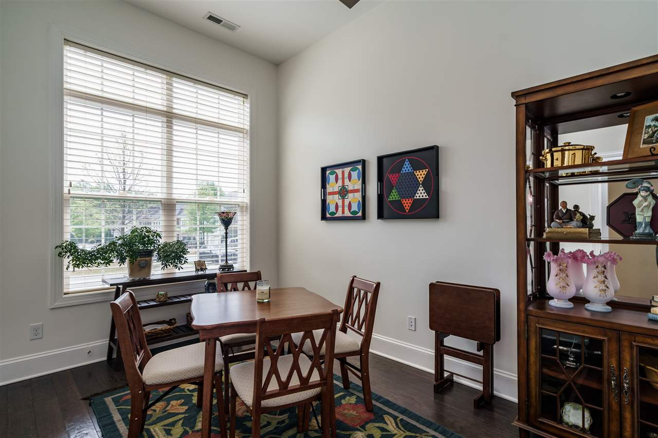4005 Periwinkle Blue Lane Raleigh, NC 27612 - Photo 11 of 29 ...has 11' ceilings and is currently being used as a card room, for regular bridge matches Main Floor Guest Bedroom
