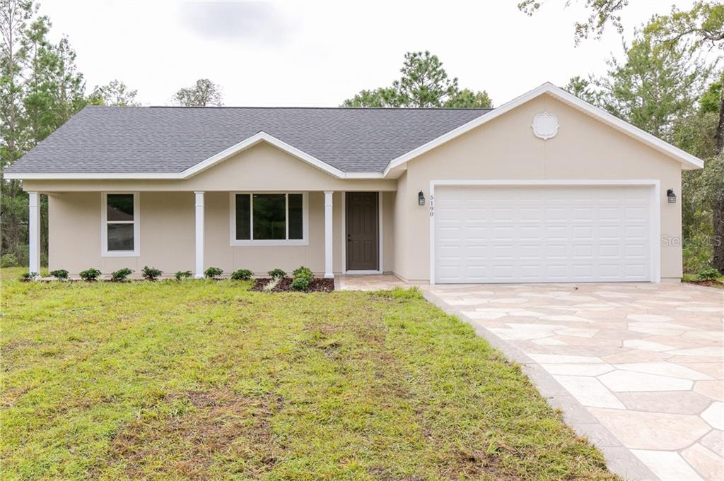 a front view of house with yard