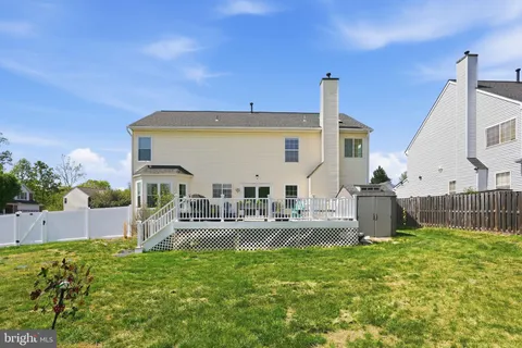 a front view of house with yard and seating area