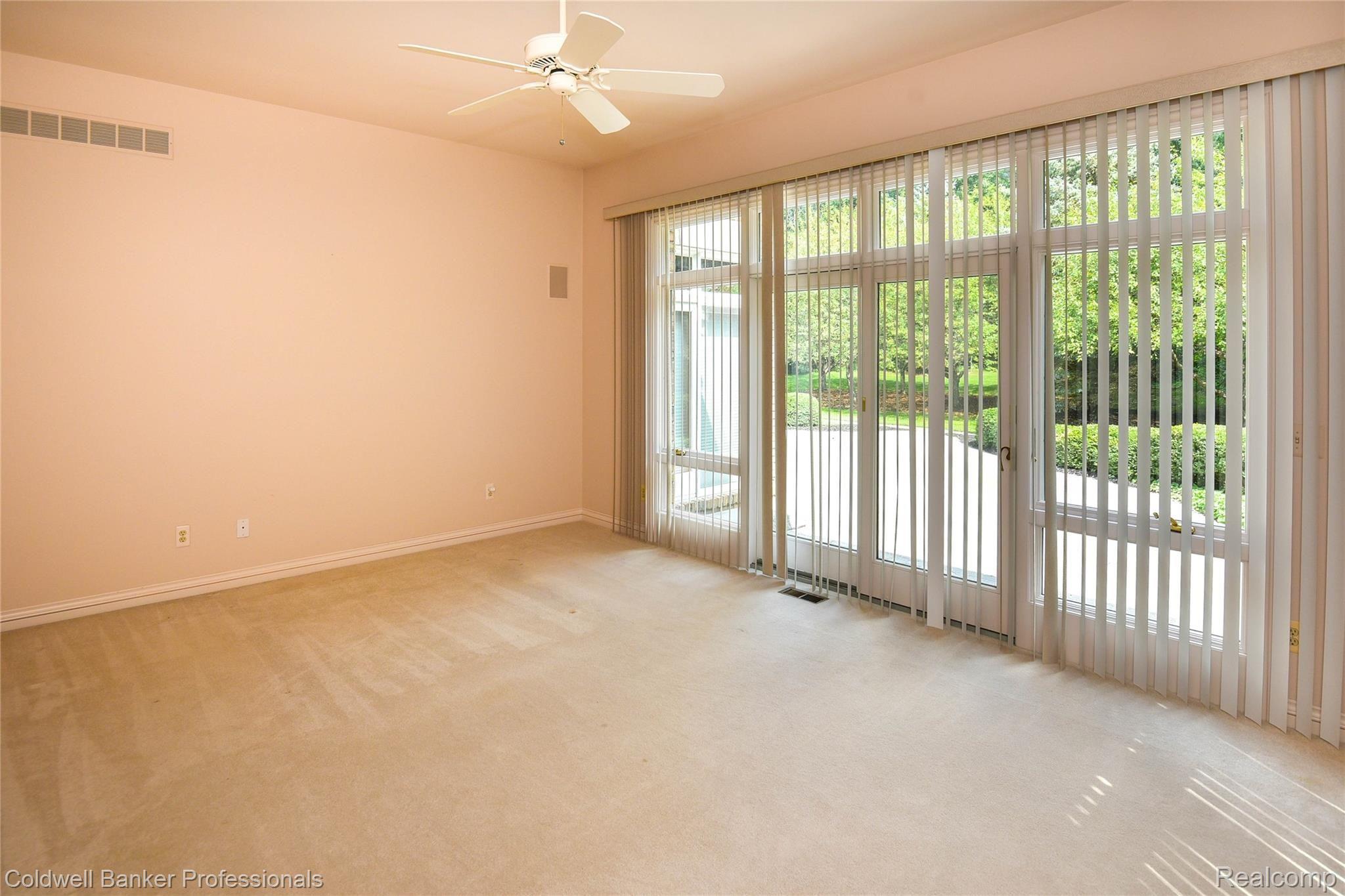 9250 Fox Hollow Road Clarkston, MI 48348 - Photo 20 of 42 Master Bedroom with door wall to patio