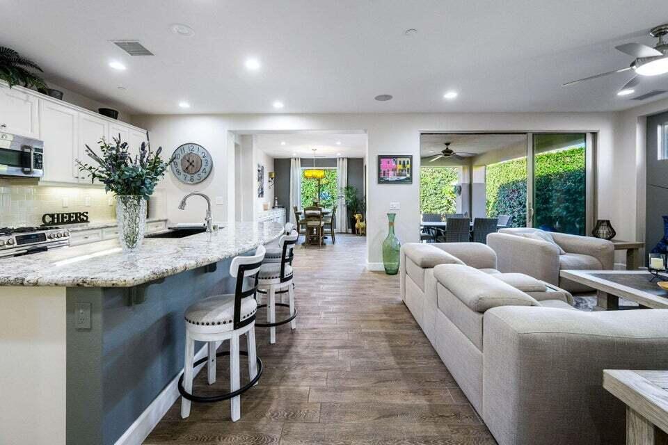 51287 Longmeadow Street Indio, CA 92201 - Photo 6 of 22 a living room with furniture and a large window