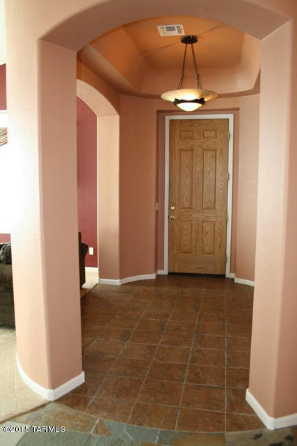 1729 East Redstart Road Green Valley, AZ 85614 - Photo 4 of 39 a view of hallway with a front door