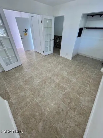 a view of a hallway with staircase