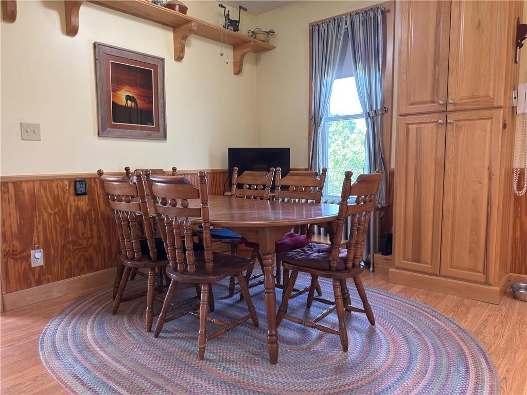 122 Coal Bank Road Greenville, PA 16125 - Photo 28 of 50 a view of a dining room with furniture window and wooden floor