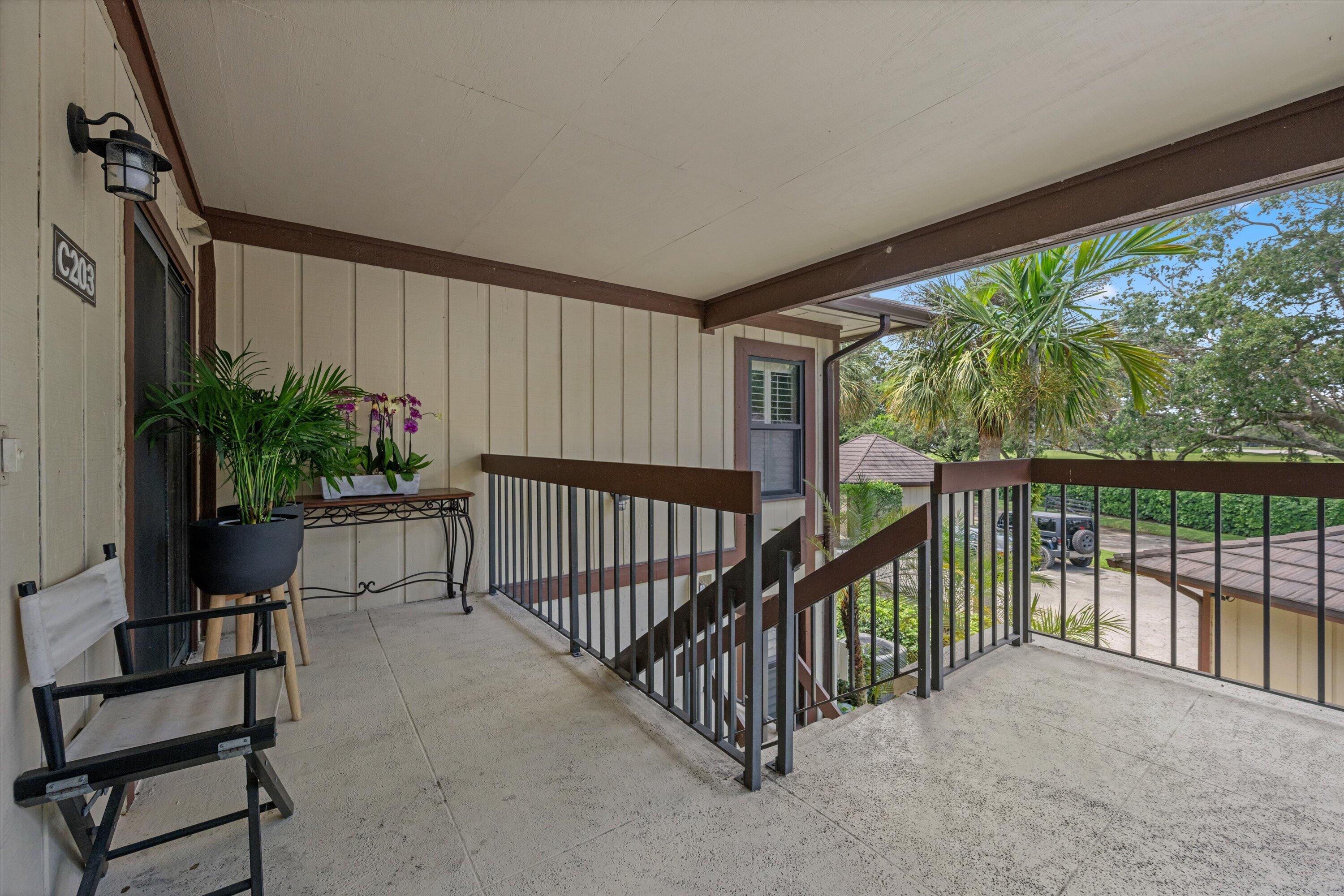 13400 Polo Road West, Unit 203 Wellington, FL 33414 - Photo 23 of 26 a view of balcony with furniture