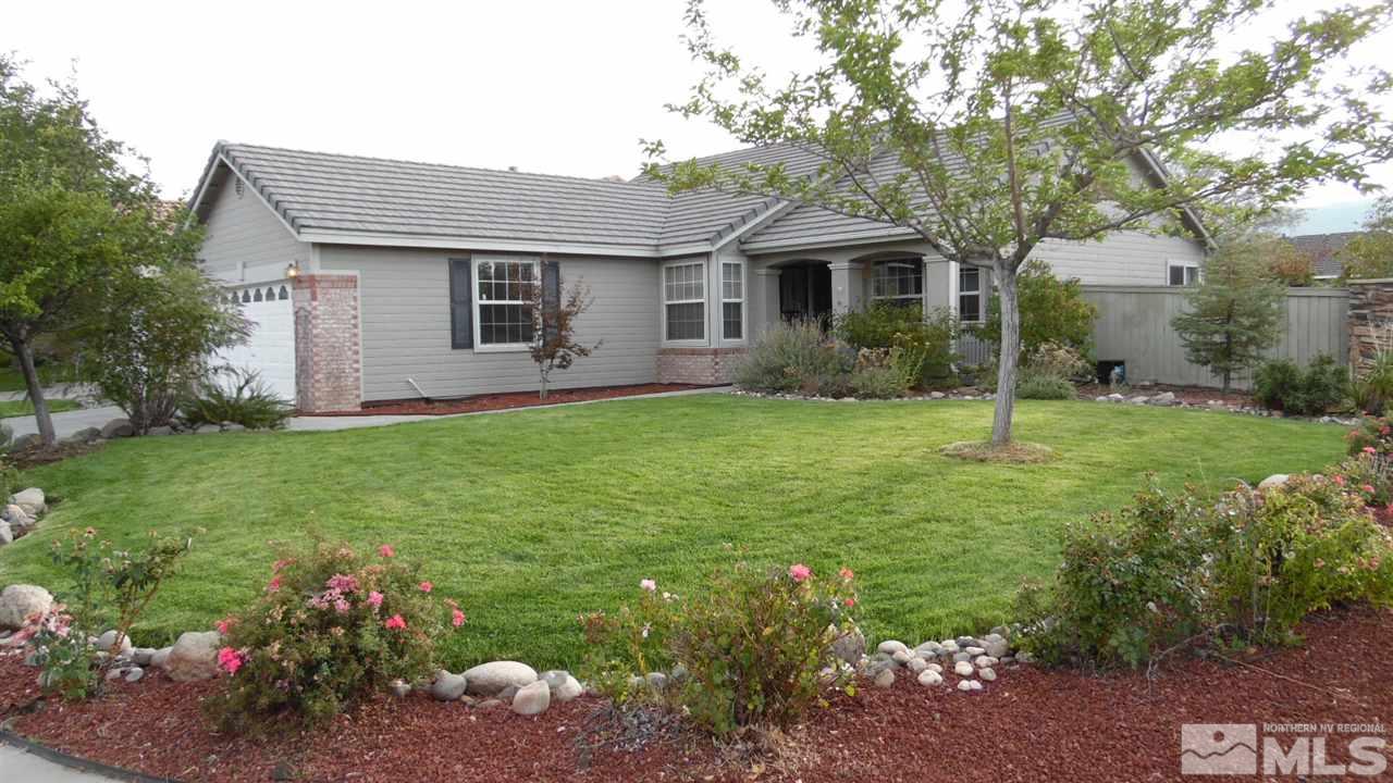 9801 Northrup Drive Reno, NV 89521 - Photo 1 of 18 a backyard of a house with lots of green space