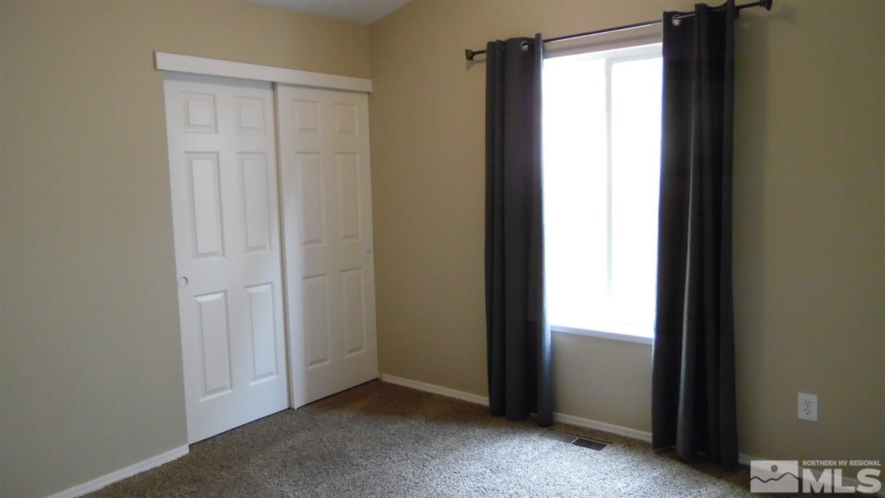 9801 Northrup Drive Reno, NV 89521 - Photo 13 of 18 a view of an empty room and a window