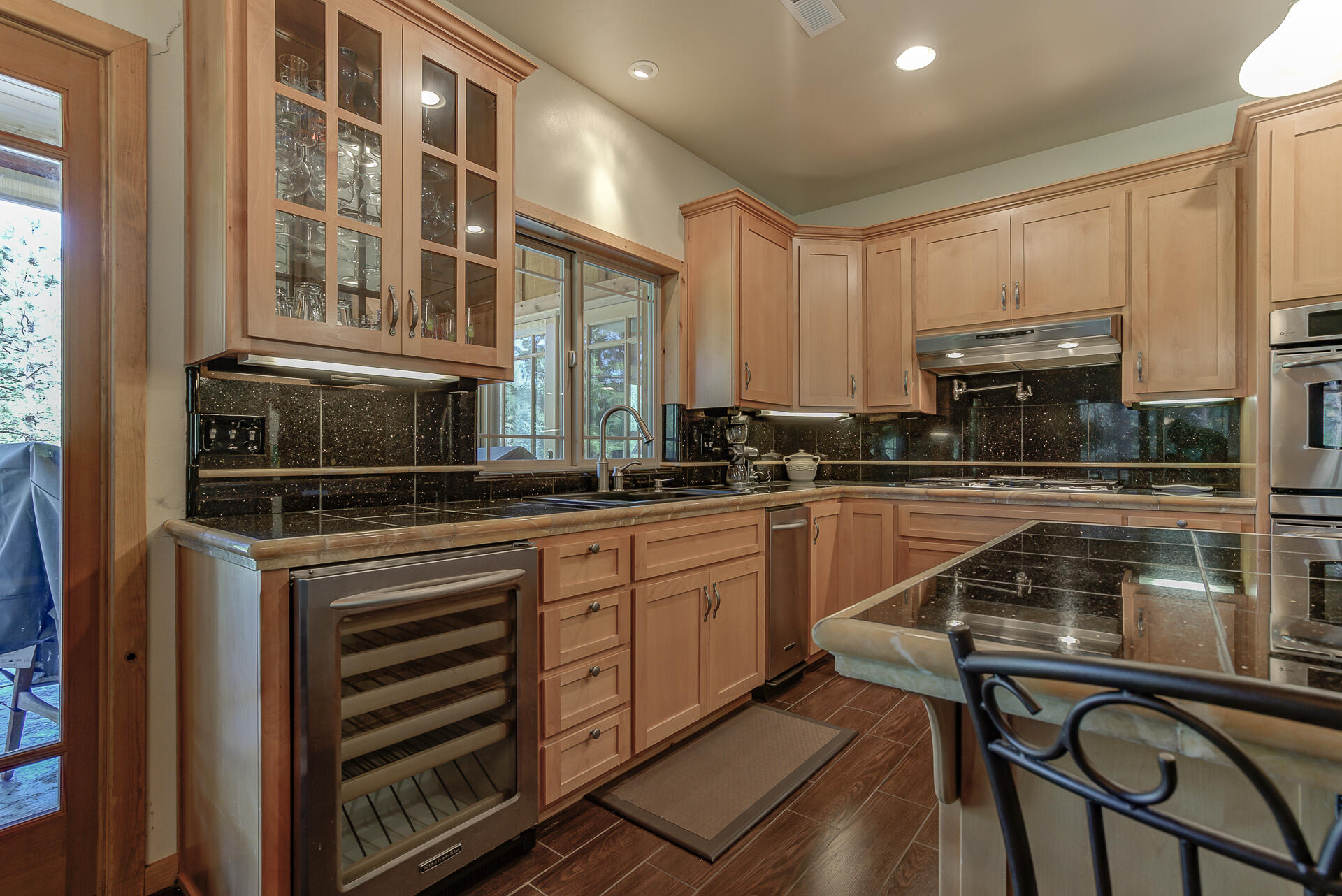 2490 Goose Ranch Road Lewiston, CA 96052 - Photo 11 of 38 a kitchen with stainless steel appliances a stove sink and cabinets