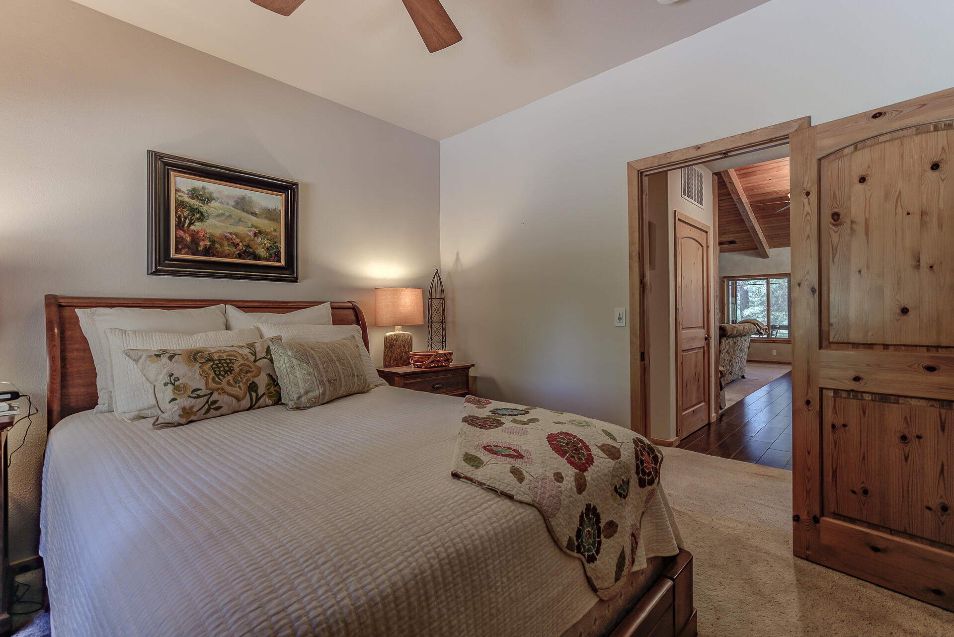 2490 Goose Ranch Road Lewiston, CA 96052 - Photo 20 of 38 a bedroom with a bed and a painting on the wall