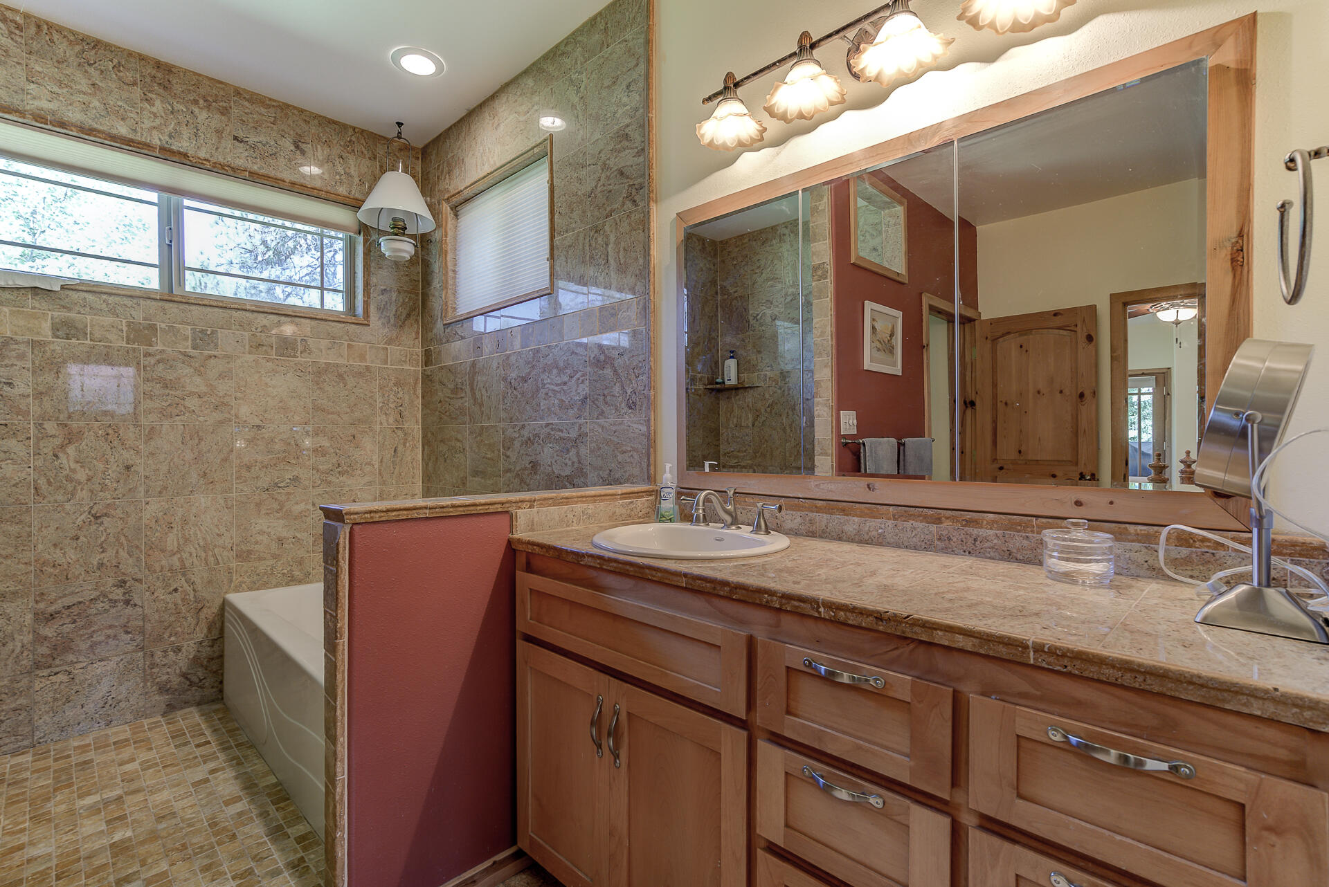 2490 Goose Ranch Road Lewiston, CA 96052 - Photo 24 of 38 a bathroom with a granite countertop sink and a mirror