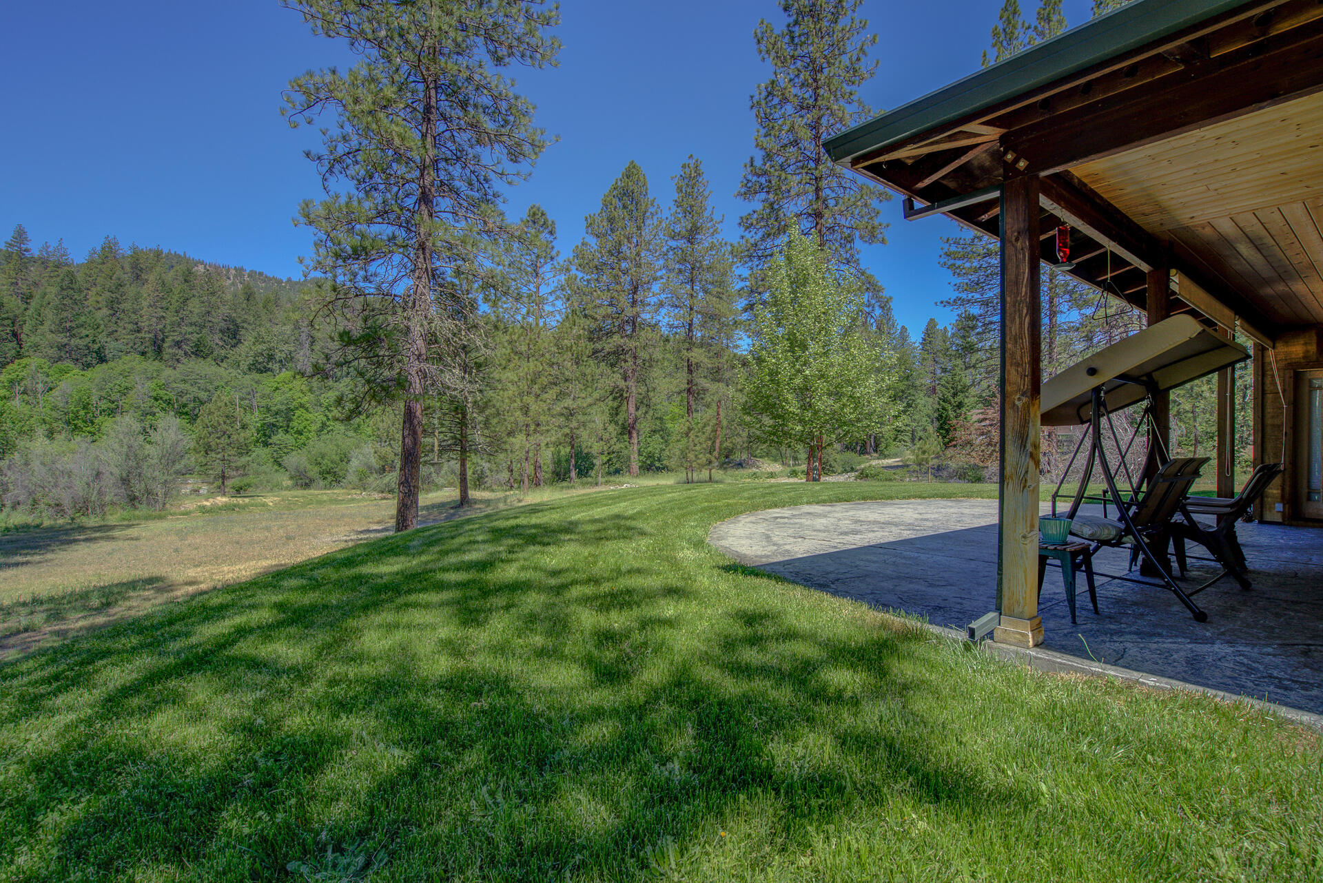 2490 Goose Ranch Road Lewiston, CA 96052 - Photo 29 of 38 a view of a backyard with a table and chairs