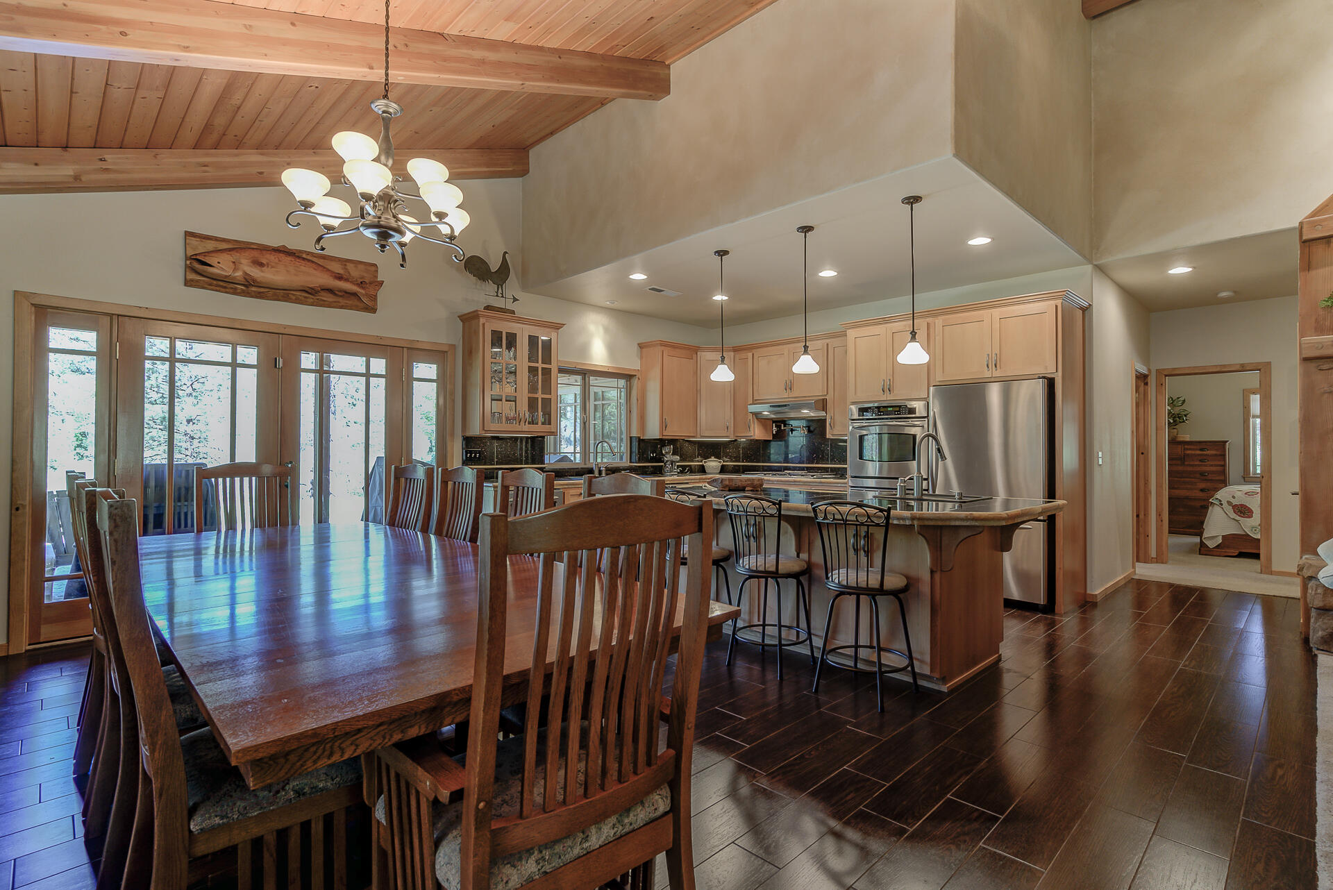 2490 Goose Ranch Road Lewiston, CA 96052 - Photo 9 of 38 a view of a dining room with furniture wooden floor and chandelier