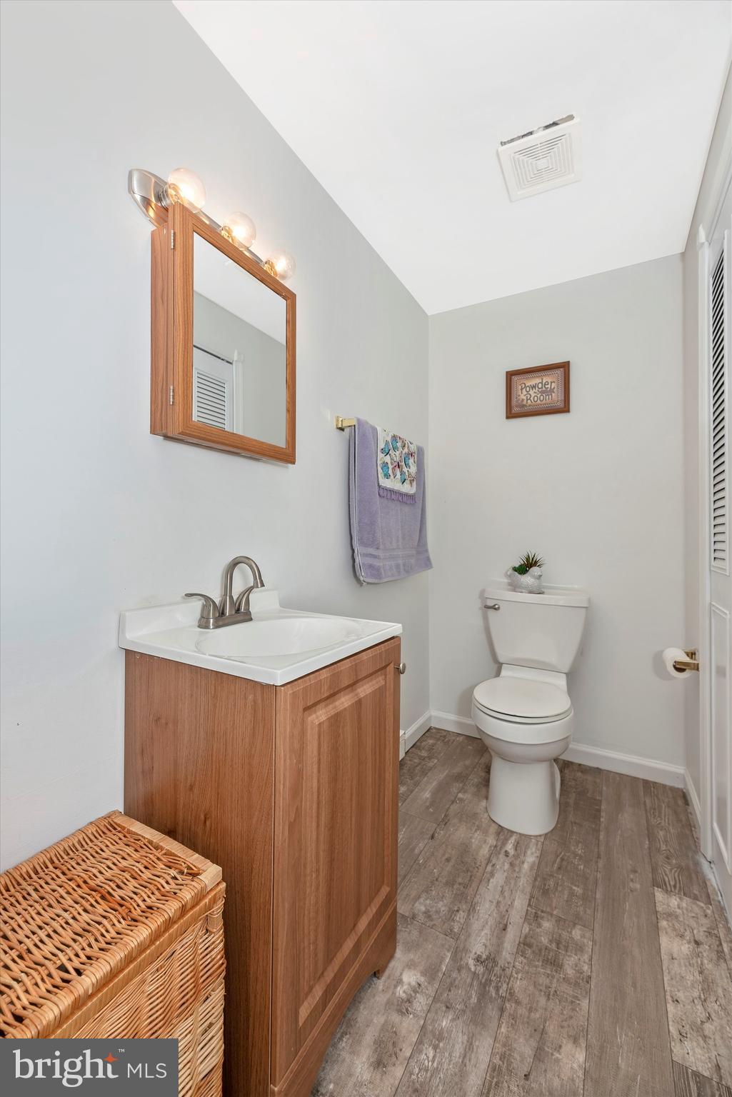 8434 Reno Monument Road Middletown, MD 21769 - Photo 22 of 44 half bath with new laminate flooring