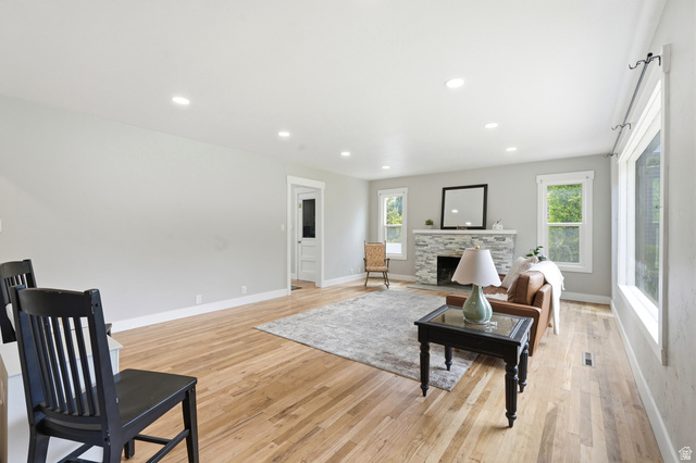 778 East 200 North Logan, UT 84321 - Photo 36 of 43 Spacious interior room featuring light wood-finish flooring, recessed lighting, and ample natural light from multiple windows