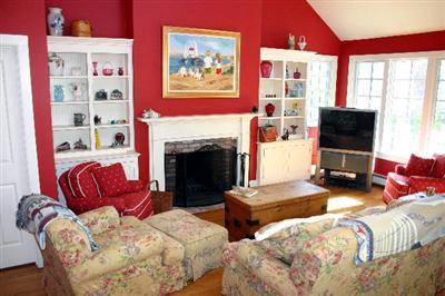 31 Hallet Lane Chatham, MA 02633 - Photo 11 of 22 a living room with furniture fireplace and flat screen tv