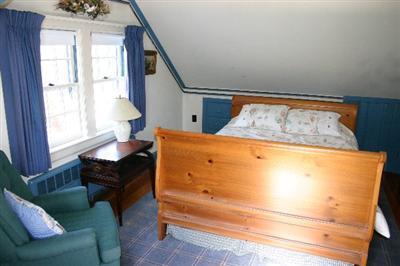 31 Hallet Lane Chatham, MA 02633 - Photo 18 of 22 a living room with furniture and a large window