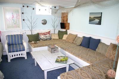 31 Hallet Lane Chatham, MA 02633 - Photo 21 of 22 a living room with furniture and wooden floor