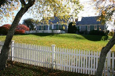 31 Hallet Lane Chatham, MA 02633 - Photo 5 of 22 a front view of a house with a garden