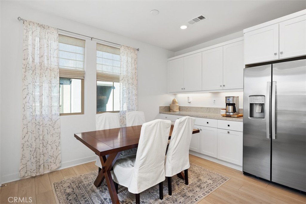 1401 Lasso Way, Unit 301 Rancho Mission Viejo, CA 92694 - Photo 10 of 43 Dining space, including kitchen countertop area.