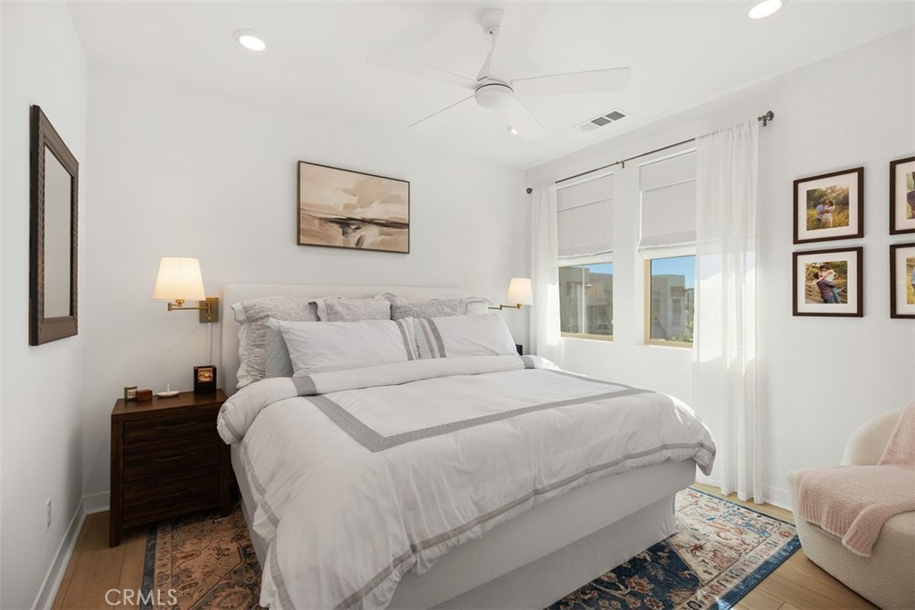 1401 Lasso Way, Unit 301 Rancho Mission Viejo, CA 92694 - Photo 19 of 43 Large, bright primary bedroom.