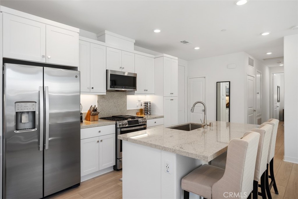 1401 Lasso Way, Unit 301 Rancho Mission Viejo, CA 92694 - Photo 9 of 43 Another view of the kitchen.
