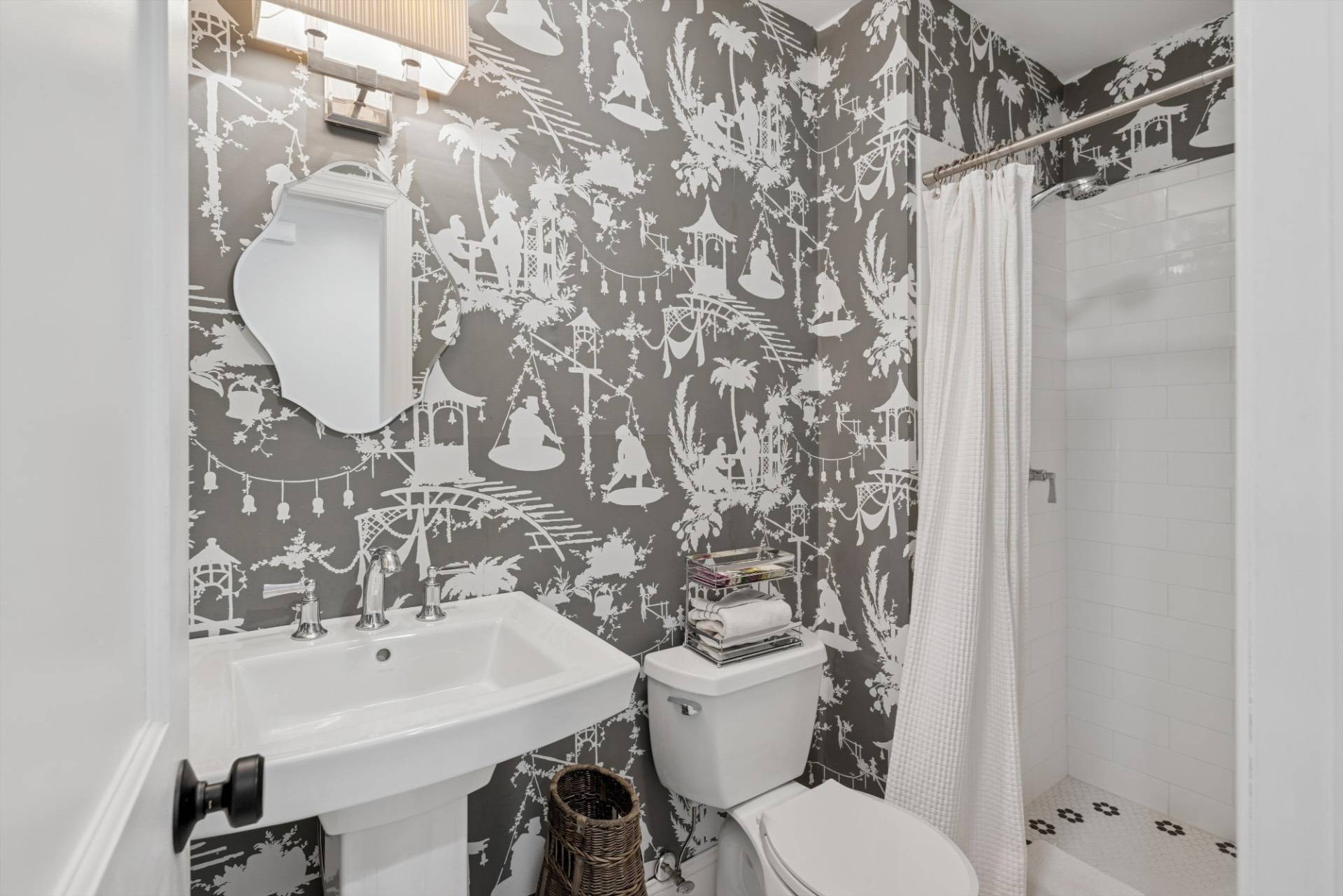 570 Hampton Road, Unit 22 Southampton, NY 11968 - Photo 12 of 26 a bathroom with a sink toilet and shower