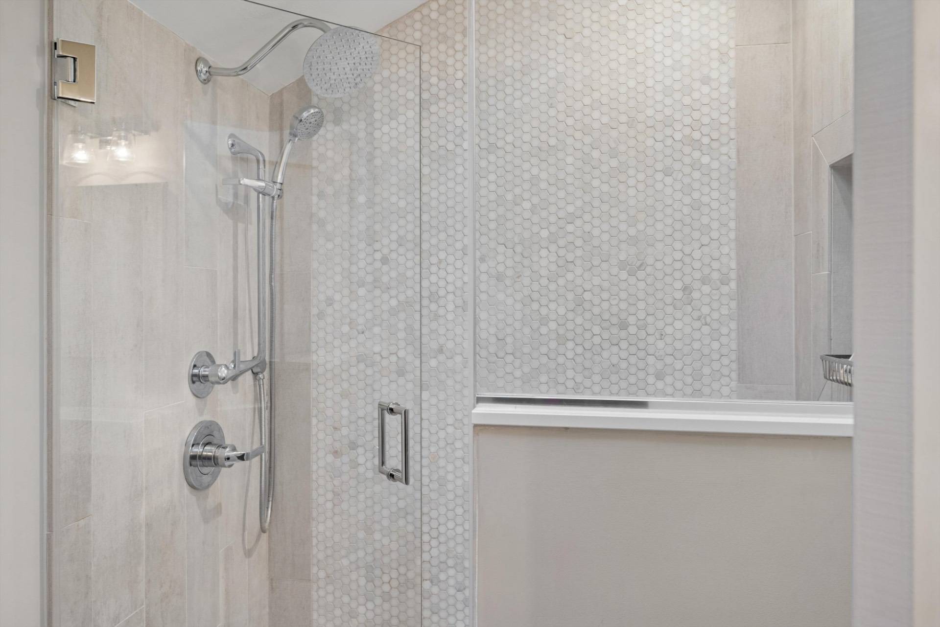 570 Hampton Road, Unit 22 Southampton, NY 11968 - Photo 20 of 26 a bathroom with a glass shower door