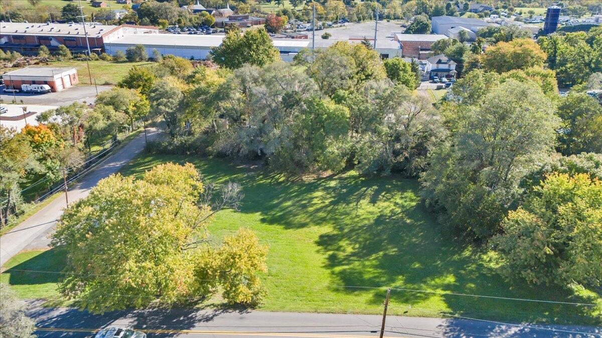 2-3 Plantation Road Northeast Roanoke, VA 24012 - Photo 7 of 13 a view of a lake with a building in the background