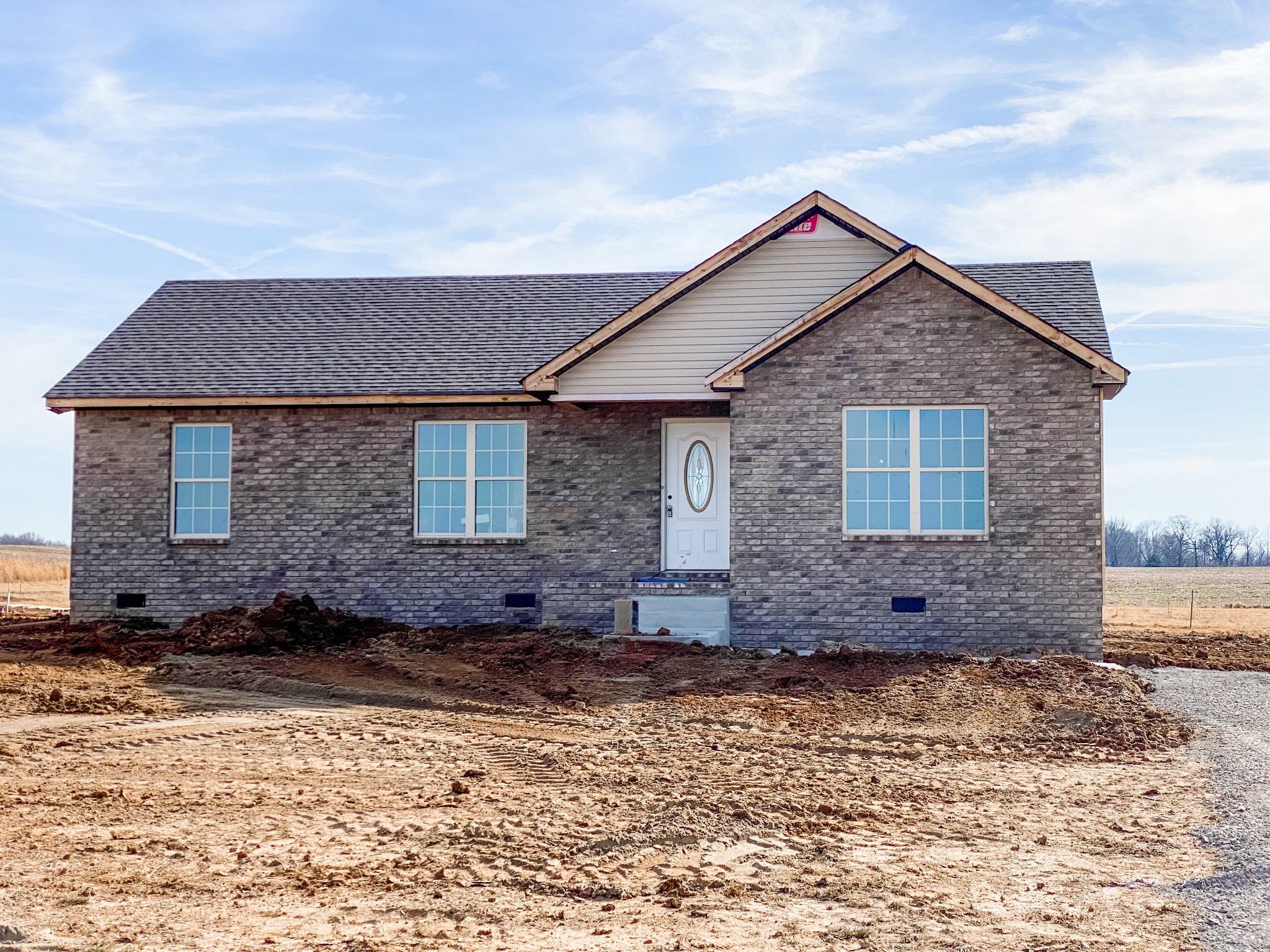 581 White Road Portland, TN 37148 - Photo 1 of 15 a front view of a house with a yard