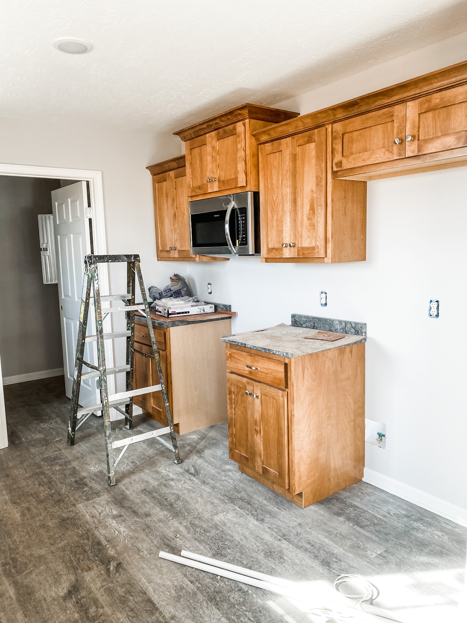 581 White Road Portland, TN 37148 - Photo 8 of 15 a view of kitchen with stainless steel appliances granite countertop sink stove top oven and cabinets