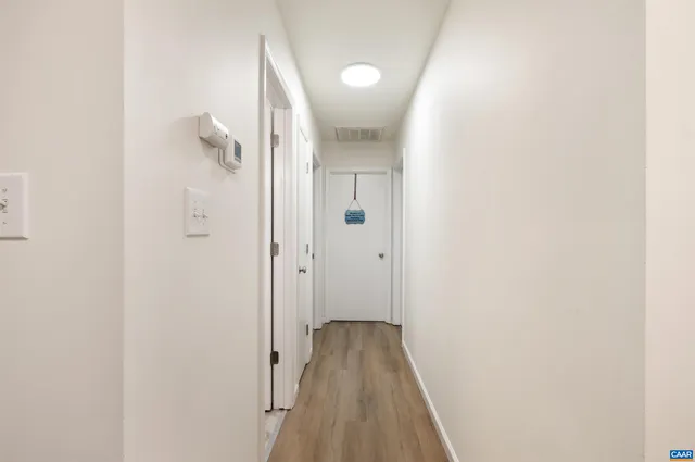 a bathroom with a sink toilet and a mirror