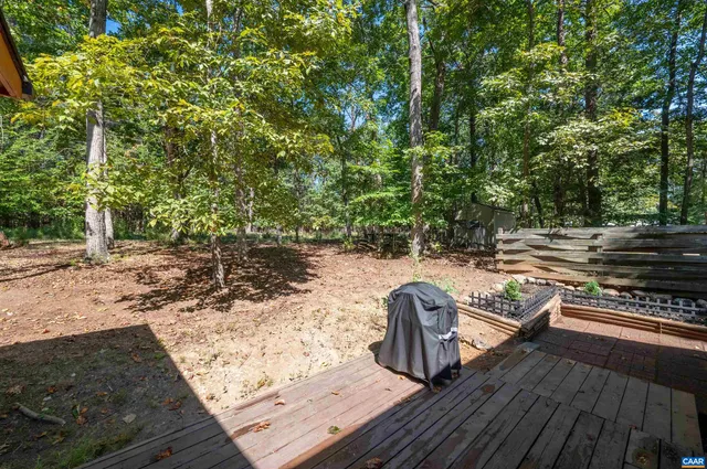 a view of a house with a tree