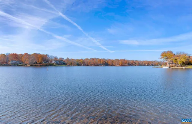 a view of a swimming pool with a lounge chairs