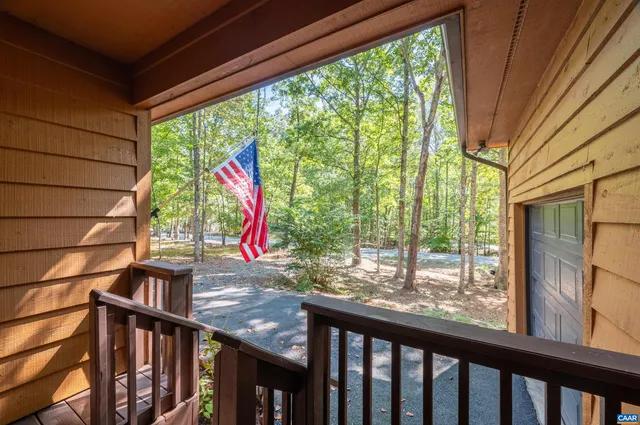 a view of outdoor space with deck and furniture
