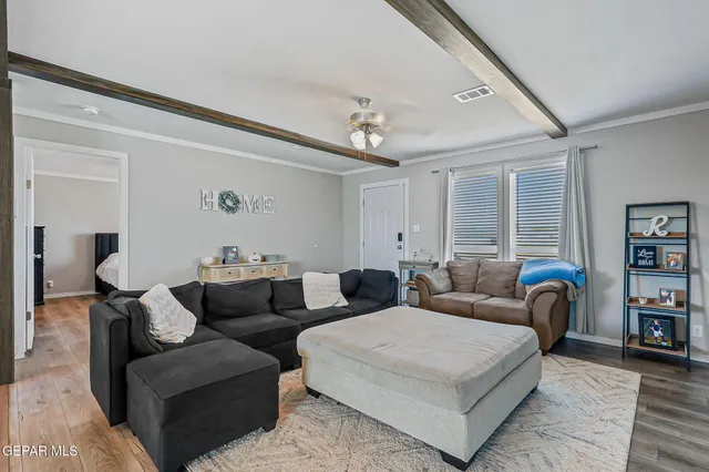 a large kitchen with a table and chairs in it