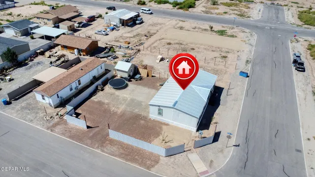 a view of a table and chairs in the patio