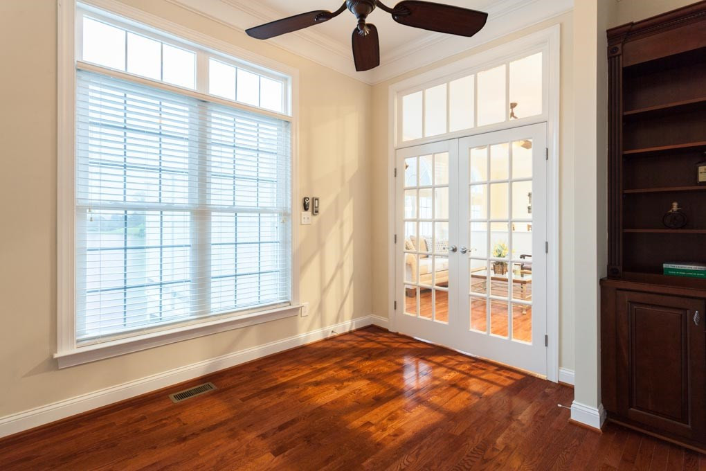 12611 Bellstone Lane Raleigh, NC 27614 - Photo 10 of 30 Built-in Cabinets, Hardwoods, and Crown Molding. Office is off the Family Room 1st Floor Office overlooking Lake