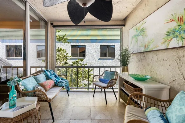 a living room with furniture and a rug
