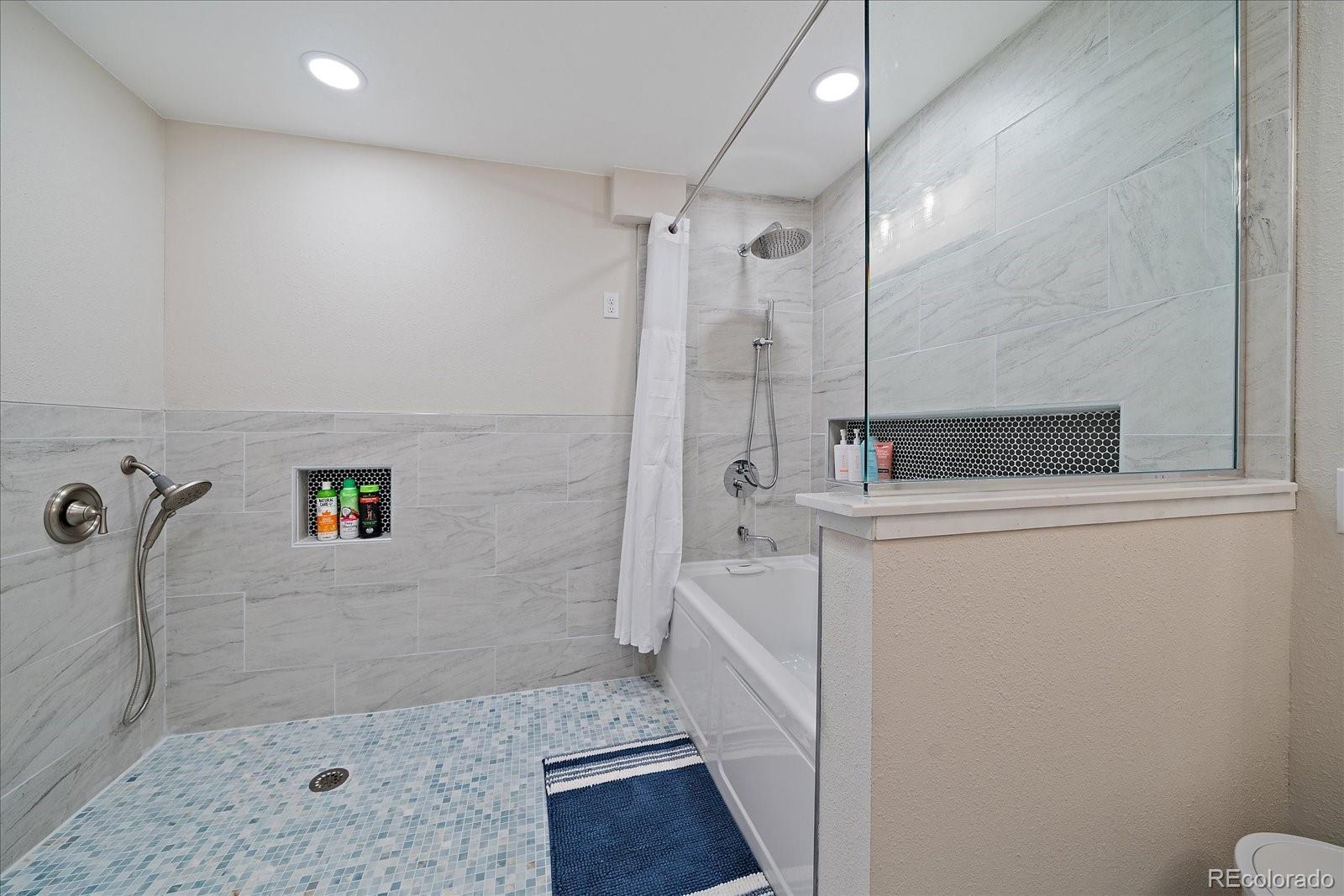 307 Snyder Mountain Road Evergreen, CO 80439 - Photo 33 of 41 a bathroom with a shower